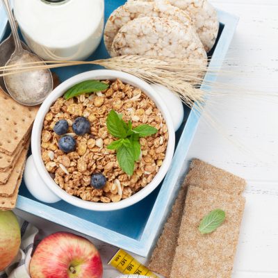 healthy breakfast set with muesli, berries and milk healthy breakfast set with muesli, berries and milk