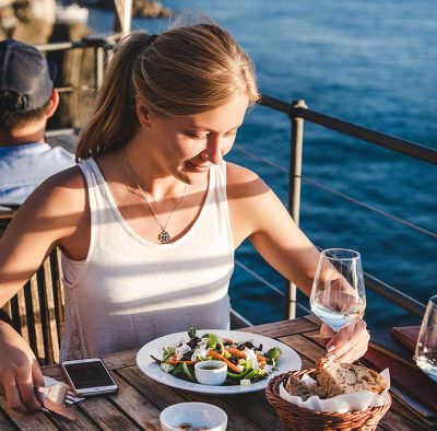 young woman having meal in open air cafe in italy 2026 01 05 06 02 37 utc